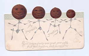 Four humanised puddings on a cutout Christmas card Four humanised puddings on a cutout Christmas card