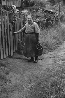 Hungarian miners wife bringing home coal for the stove from Hungarian miners wife bringing home coal for the stove from