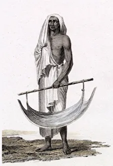 An Indian grass cutter with ingenious grass container Date: circa 1810 An Indian grass cutter with ingenious grass container Date: circa 1810