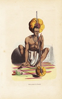 Indian musician in dhoti and necklace playing the pennak Indian musician in dhoti and necklace playing the pennak