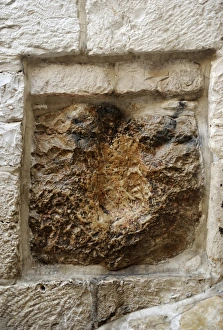 Israel. Jerusalem. Via Dolorosa. V Station. Stone with the p Israel. Jerusalem. Via Dolorosa. V Station. Stone with the p