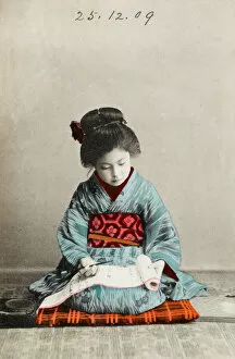 Education Gallery: Japanese girl practising calligraphy