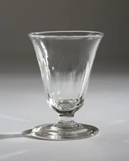 <b class=qtipBold><figcaption>Jelly glass</figcaption></b><br>Short jelly or dessert glass cut with round topped flutes on a short stem and plain foot, made in England c.1830-1840. Date: c.1830-1840<br><em>© The Geffrye Museum of the Home / Mary Evans Picture Library</em> Jelly glass