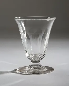 <b class=qtipBold><figcaption>Jelly glass</figcaption></b><br>Short jelly or dessert glass cut with round-topped flutes on short stem and plain foot made in England in c.1830-40. Date: c.1830-1840<br><em>© The Geffrye Museum of the Home / Mary Evans Picture Library</em> Jelly glass