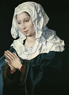 Joos Van Cleve (1485-1541). The Virgin Mary praying Joos Van Cleve (1485-1541). The Virgin Mary praying