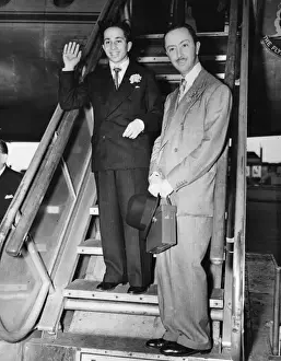 Prints of King Faisal II of Iraq (1935-1958) the last King of Iraq, at London Airport returning home after studying at Harrow Heathrow Airport Prints: King Faisal II of Iraq at London Airport Print (1935-1958)
