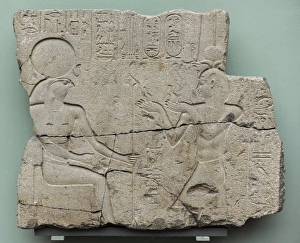 King Ptolemy II offering eye-paint to the God Horakhte. Egyp King Ptolemy II offering eye-paint to the God Horakhte. Egyp