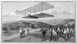 <b class=qtipBold><figcaption>Kitty Hawk Glider Flight</figcaption></b><br>Orville and Wilbur Wright test unpowered gliders against the wind at Kitty Hawk. The first powered flight was achieved there on 17th December 1903<br><em>© Mary Evans Picture Library</em> Kitty Hawk Glider Flight