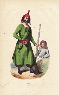 Kurdish man wearing a distinctive hat, tunic and pantaloons Kurdish man wearing a distinctive hat, tunic and pantaloons