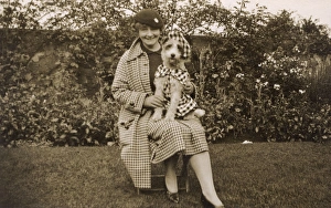 Lady with dog in fancy dress Lady with dog in fancy dress
