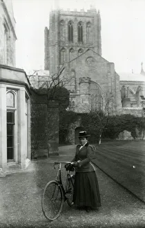 Lady with safety bicycle, Hereford Cathedral Lady with safety bicycle, Hereford Cathedral