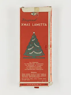 <b class=qtipBold><figcaption>Lametta box</figcaption></b><br>Lametta for Decorating Christmas Trees', a cardboard box containing strips of silver lametta, manufactured in England, c.1930-1940. Date: c.1930-1940<br><em>© The Geffrye Museum of the Home / Mary Evans Picture Library</em> Lametta box