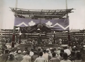 Large crowd watching sumo wrestling outdoor arena Large crowd watching sumo wrestling outdoor arena