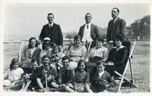 Large extended family group on a British beach Large extended family group on a British beach