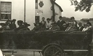 A large open-top Charabanc Party outside a Hotel, about to set off on a tour A large open-top Charabanc Party outside a Hotel, about to set off on a tour