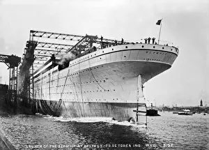 Prints of Launch of the Olympic at Belfast, 20Th October 1910 - a view of the launch of the leviathan Olympic with men standing at the stern. (Location: Northern Ireland: County Antrim: Belfast) Belfast Prints: Launch of the Olympic at Belfast Print, circa early 1900s