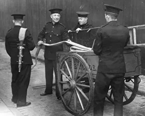LCC-LFB firefighters with old hose cart LCC-LFB firefighters with old hose cart