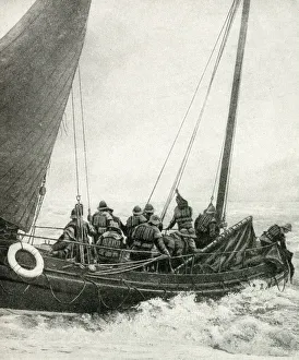 Lifeboat crew in action at sea, English coast Lifeboat crew in action at sea, English coast