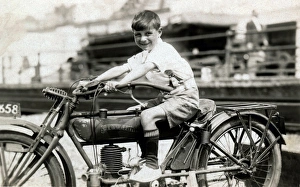 Cleveland Gallery: Little boy on a 1910 Cleveland motorcycle