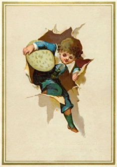 Little boy with an Easter egg bursting through paper Little boy with an Easter egg bursting through paper