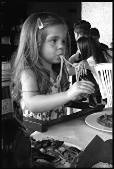 Images Dated 13th June 2014: Little girl eating spaghetti, Italy