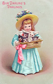 Little girl with kittens in a basket on a postcard Little girl with kittens in a basket on a postcard