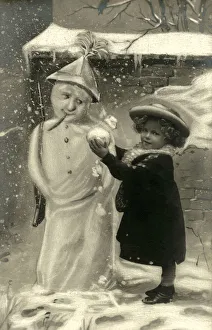 Little Girl with unusual snowman with newspaper hat and gun Little Girl with unusual snowman with newspaper hat and gun