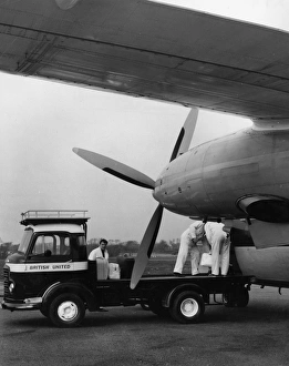 Loading a plane at Jersey Airport, Channel Islands Loading a plane at Jersey Airport, Channel Islands