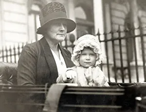 Majesty Gallery: Her Majesty Queen Elizabeth II as baby in pram with nanny