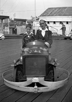 Bumper Collection: Man and boy in dodgem car