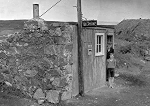 Postal Gallery: Man and boy, Timsgarry Post Office, Isle of Lewis
