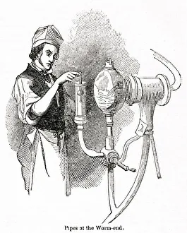 Processing Gallery: Man checking pipes at a distillery, south-west London