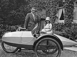Man and two children with motorbike and sidecar Man and two children with motorbike and sidecar