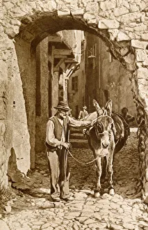 Man and donkey in Puget-Theniers, Alpes-Maritimes, France Man and donkey in Puget-Theniers, Alpes-Maritimes, France
