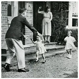 Man greeted by his evacuated children and wife 1939 Man greeted by his evacuated children and wife 1939