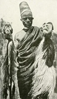 Man with two monkey heads, East Africa Man with two monkey heads, East Africa