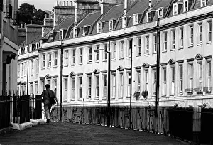 A man walks briskly along The Paragon in the centre of Bath A man walks briskly along The Paragon in the centre of Bath