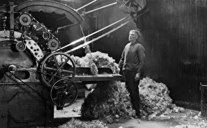 Man at work in Harris Tweed mill
