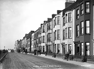 Prints of Mark Street, Portrush - a street scene showing boarding houses and horse vehicles and people. (Location: Northern Ireland: County Antrim: Portrush). Date: circa early 1900s Antrim Prints: Early 20th Century Print of Portrush Street Scene