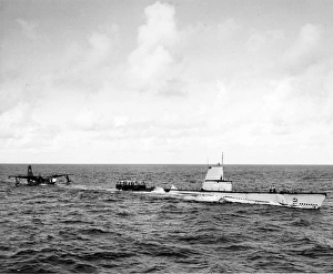 A Martin P5M-1 Marlin is refuelled on the open sea A Martin P5M-1 Marlin is refuelled on the open sea