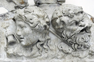 Masks of Dionysos and Silenos. Roman relief. 2nd century AD Masks of Dionysos and Silenos. Roman relief. 2nd century AD