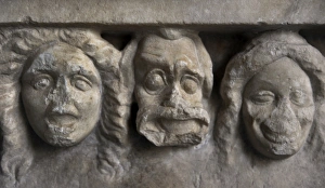 Detail of the masks of a votive stele. 4th century BC Detail of the masks of a votive stele. 4th century BC
