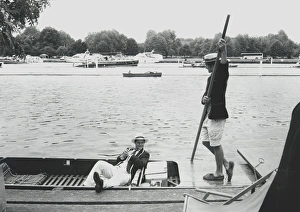 Two men on a punt, Henley-on-Thames, Oxfordshire Two men on a punt, Henley-on-Thames, Oxfordshire