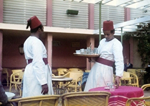 Two men in traditional Egyptian waiter?s dress in a restaura Two men in traditional Egyptian waiter?s dress in a restaura