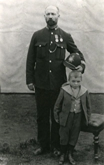 Metropolitan Police officer with young son Metropolitan Police officer with young son