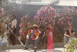 Tijuana Gallery: Mexican man, boy and woman sit on side of a street, Tijuana