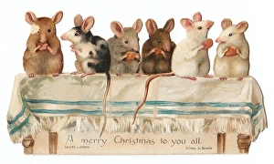 Six mice on a table on a cutout Christmas card Six mice on a table on a cutout Christmas card