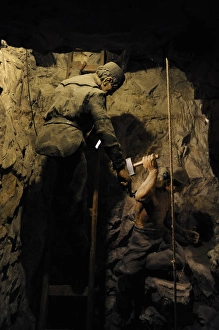 Mining. Shaft sinking by hand with hammer and wedge. Diorama Mining. Shaft sinking by hand with hammer and wedge. Diorama