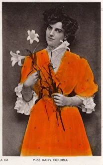 Miss Daisy Cordell holding two Lilies Miss Daisy Cordell holding two Lilies