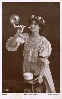 Miss Zena Dare blowing a large bubble Miss Zena Dare blowing a large bubble